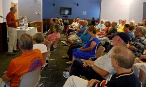 Guest speaker Bob Lee entertains the audience. Photo by Michael Allard.